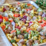 Sheet Pan Italian Sausage and Cheese Tortellini on a wooden background