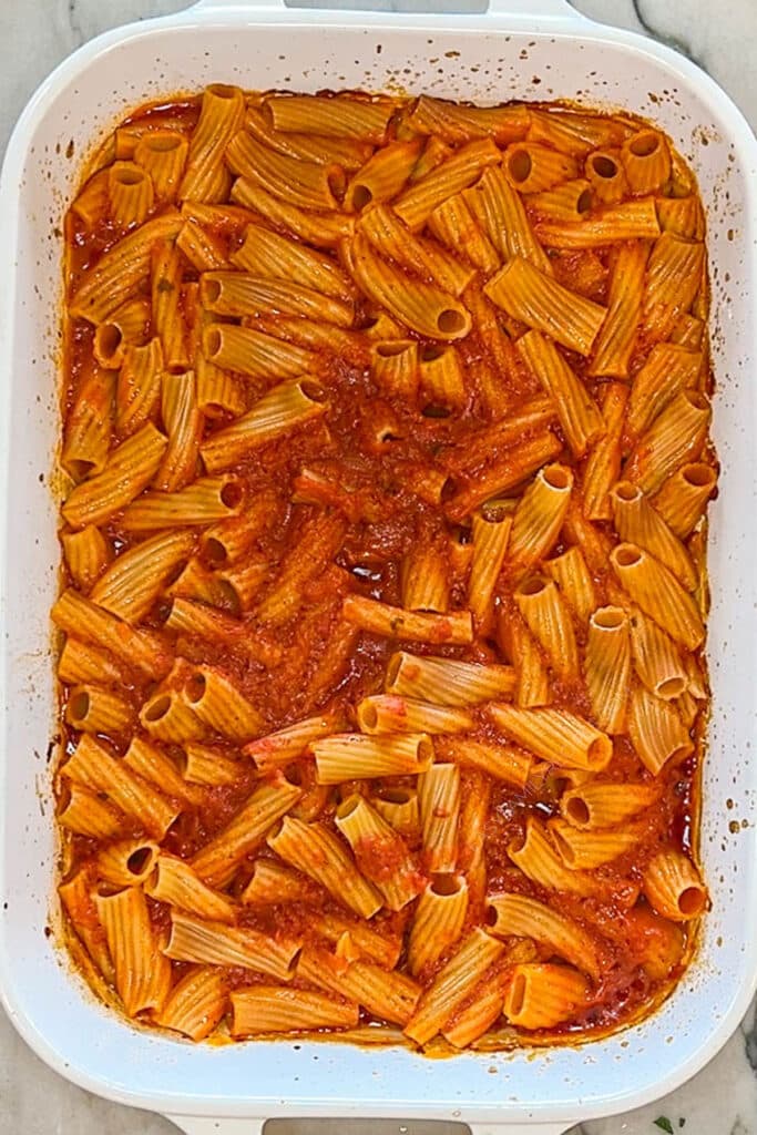Cover with foil placed on top of pasta baking dish. Bake pasta