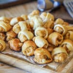 Pile of Chicks in a Blanket on a wooden board