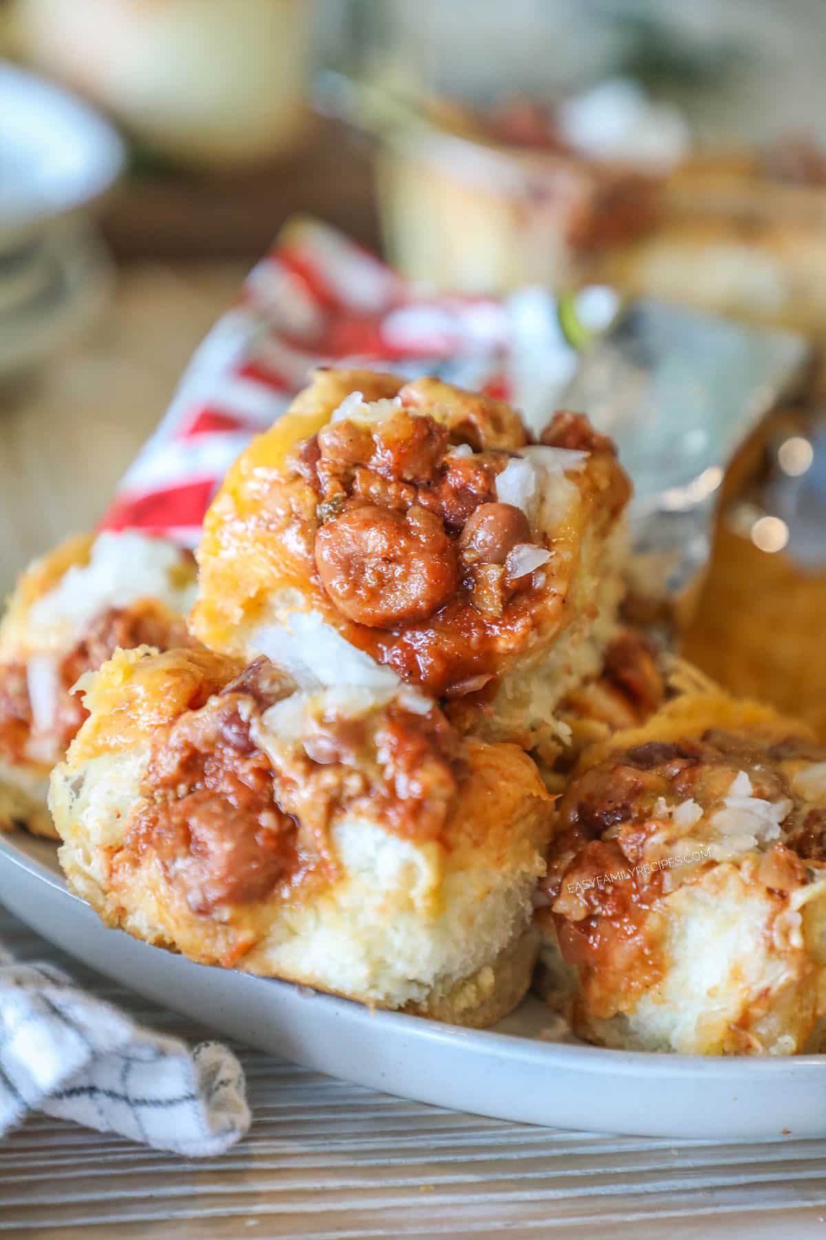 White plate of chili dog sliders