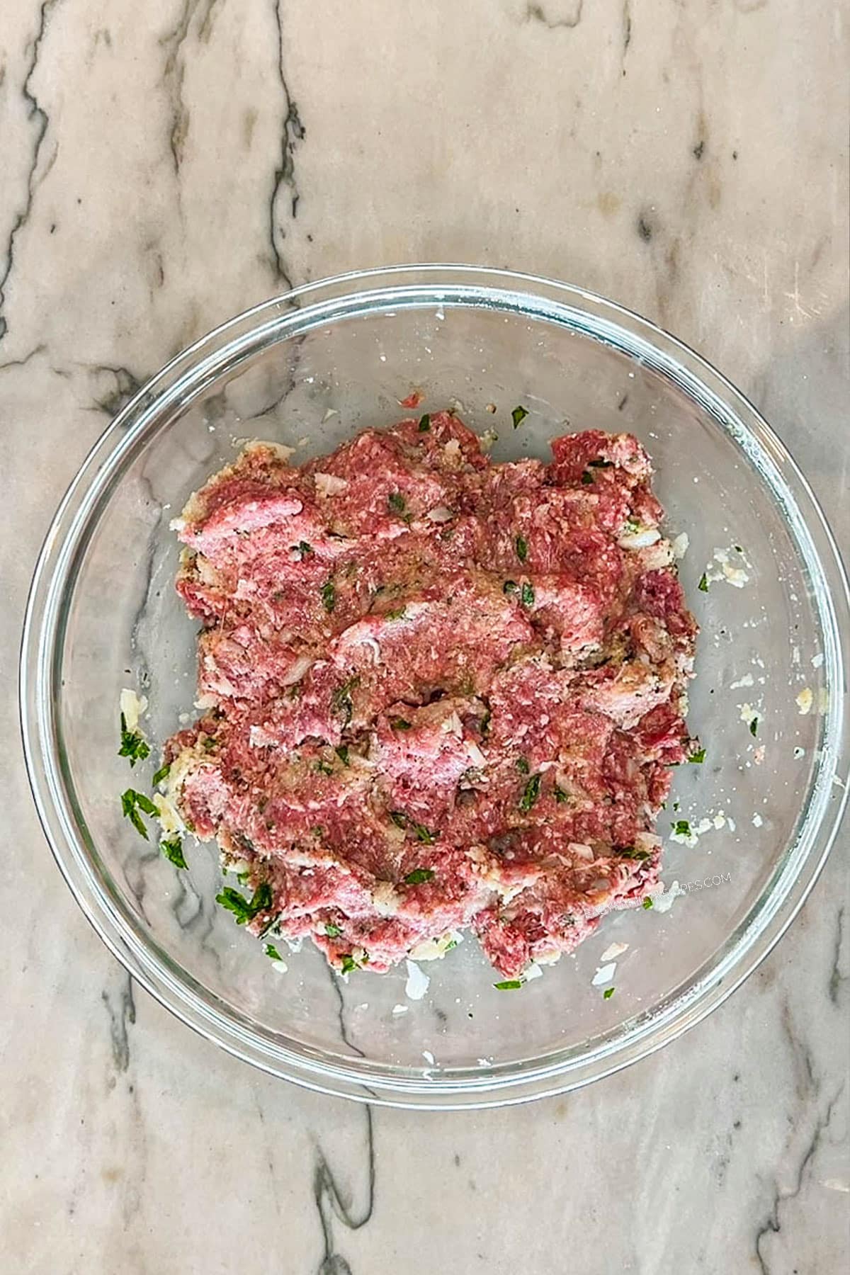 Step 2 for making Mini Meatloaf Sheet Pan Dinner. Combine mixture together