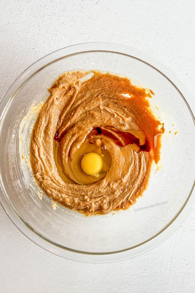 egg added to cookie dough mixture.