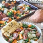 Bowl of sheet pan sausage and sweet potatoes with garlic bread and text overlay that readsy sheet pan sausage and sweet potatoes.