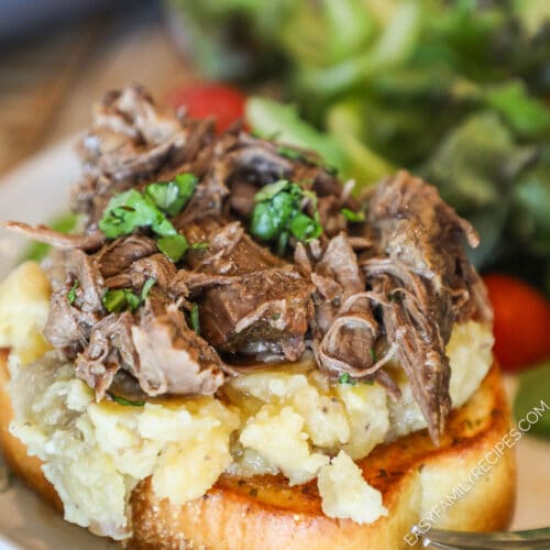 Crockpot beef manhattan on toast with mashed potatoes.