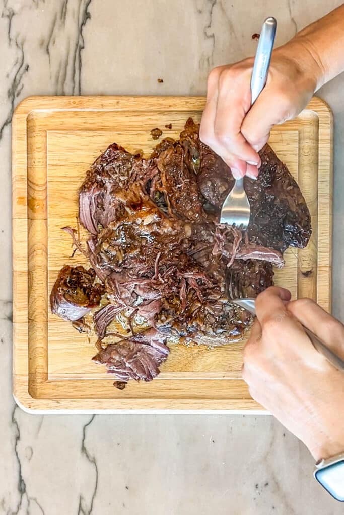 Shredding chuck roast for beef manahattan.