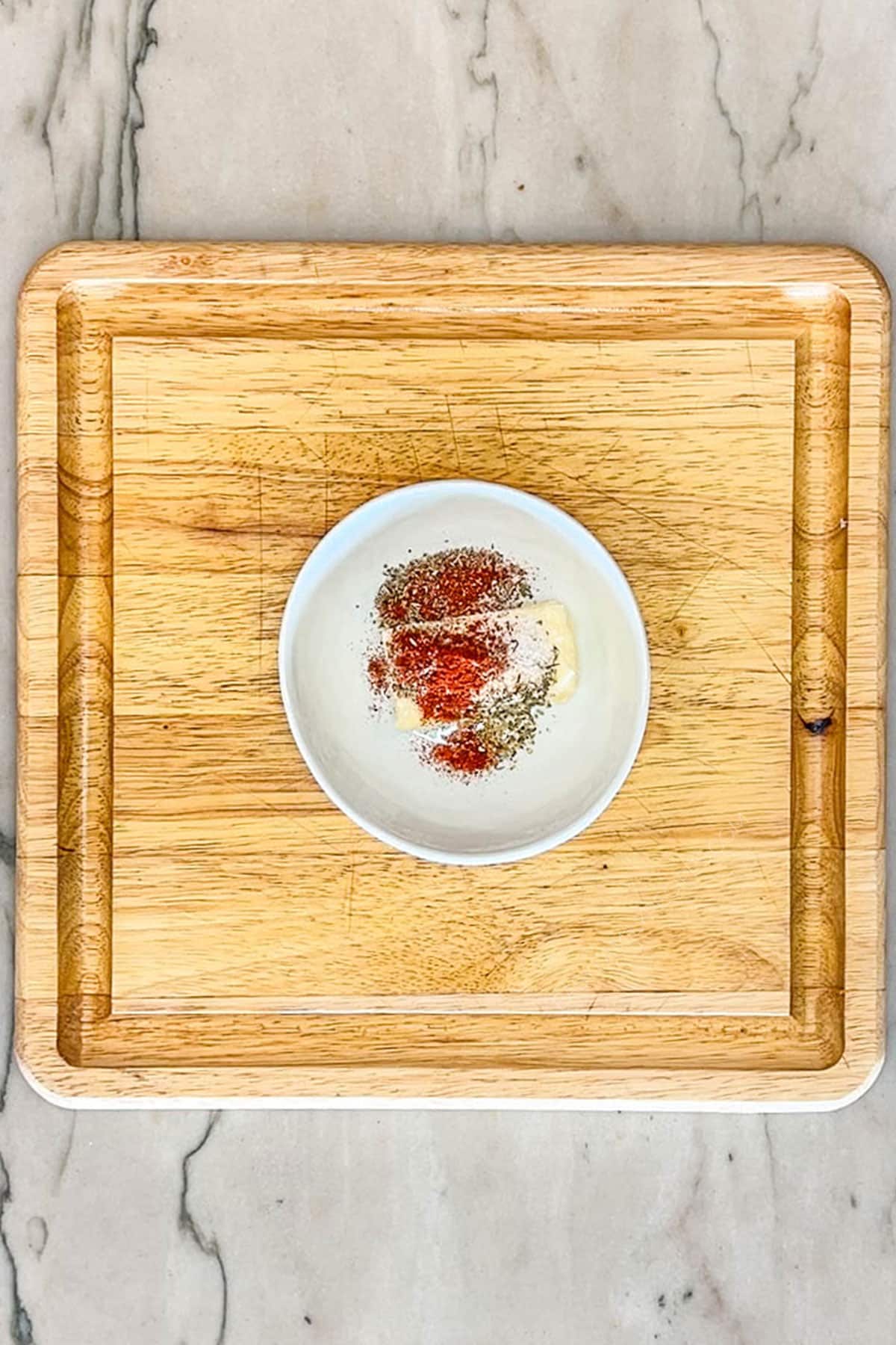 spices mixed together in a small dish.