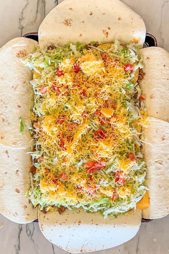 Fillings added for sheet pan crunch wrap supremes.